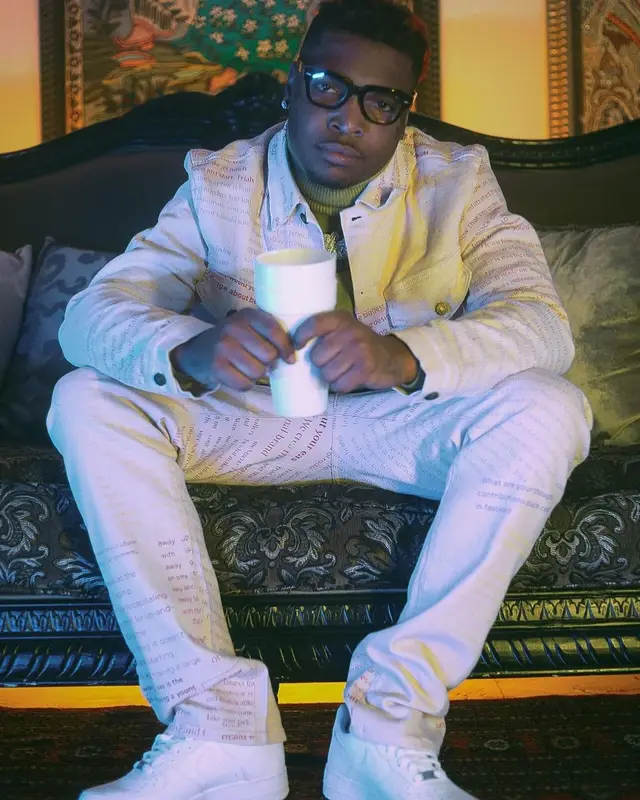 Lil Keed outfit in Tier, Nike, and Ray-Ban, 2021