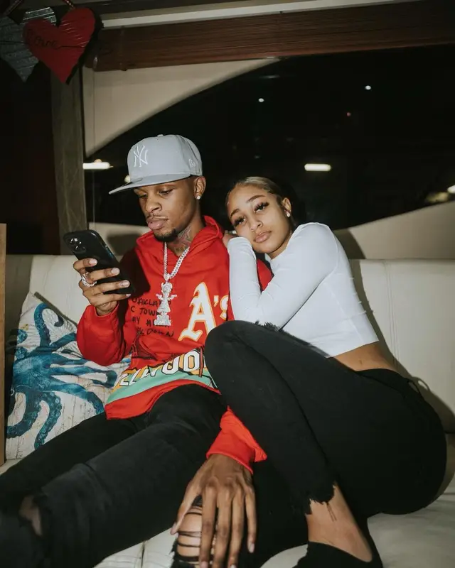 Toosii outfit in Homme + Femme, Amiri, and New Era, 2021