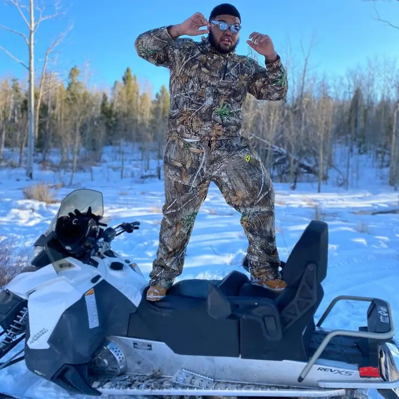 Druski outfit in Realtree , Timberland, and Louis Vuitton, 2020