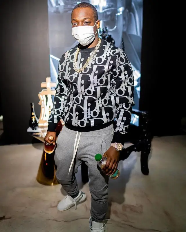 Bobby Shmurda outfit in Dior, Balmain, and No Name, 2021