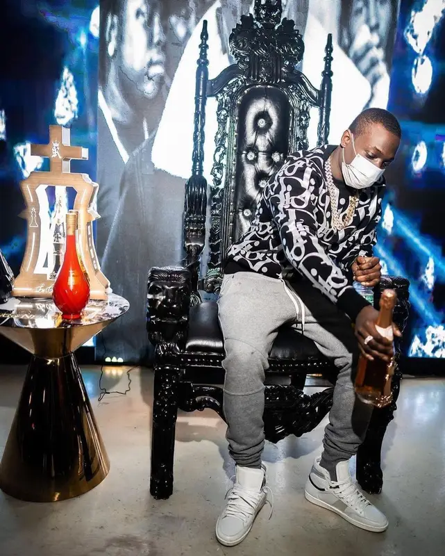 Bobby Shmurda outfit in Dior, Balmain, and No Name, 2021