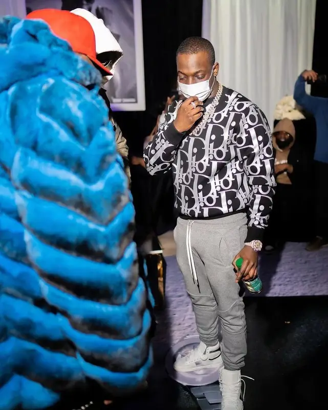 Bobby Shmurda outfit in Dior, Balmain, and No Name, 2021