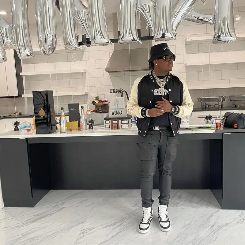 Gunna outfit in Dior, Louis Vuitton, and Celine, 2021