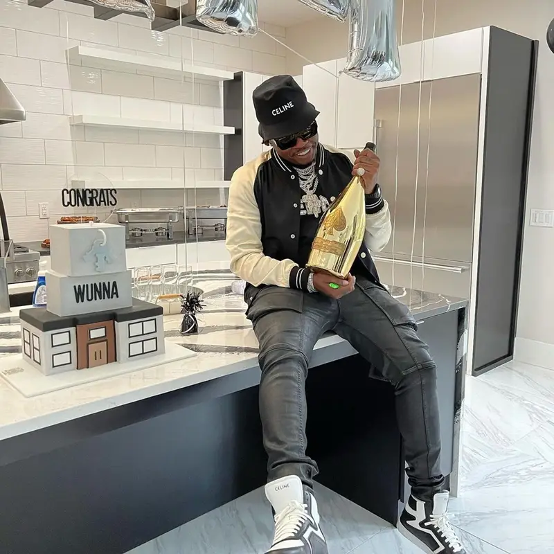 Gunna outfit in Dior, Louis Vuitton, and Celine, 2021