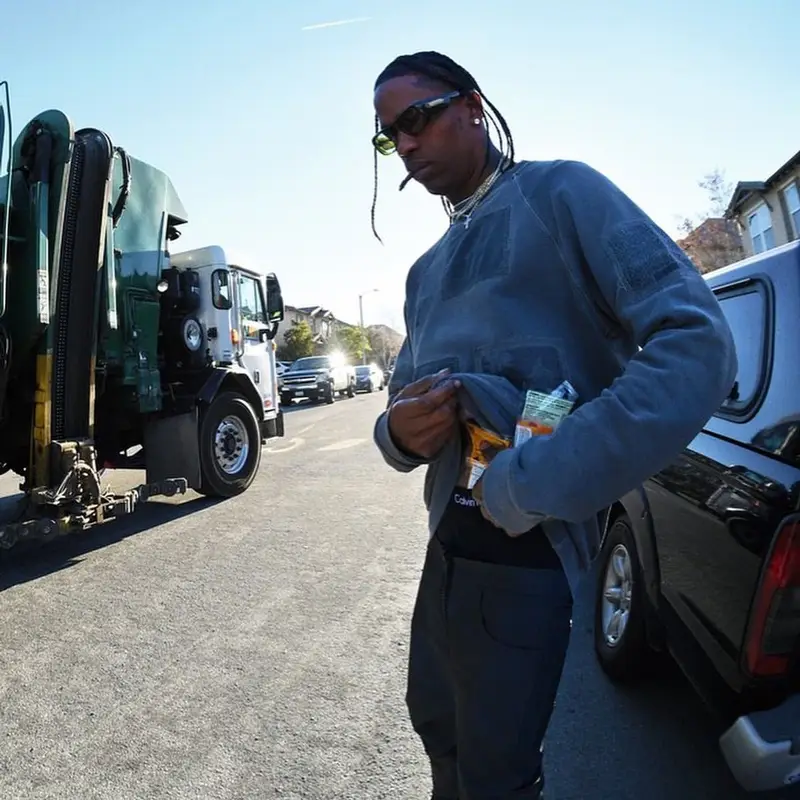 Travis Scott outfit in Raf Simons, Nike, and Calvin Klein, 2021