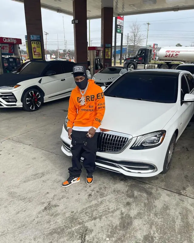 DaBaby outfit in Burberry, Chrome Hearts, and Dickies, 2021