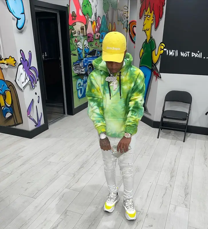 Rylo Rodriguez outfit in Amiri, Dior, and Palm Angels, 2021