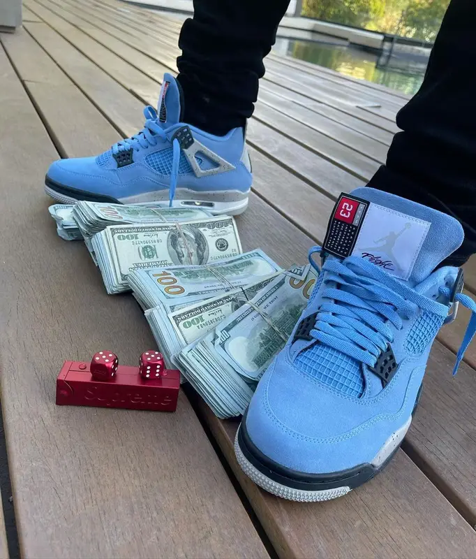 Moneybagg Yo outfit in Louis Vuitton, Supreme, and New Era, 2021