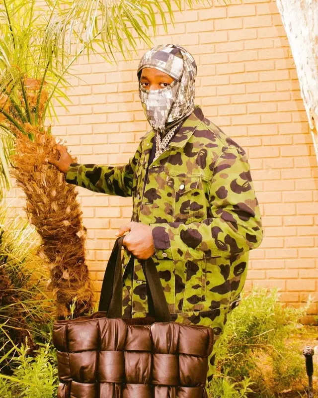Don Toliver outfit in Bape, Bottega Veneta, and Levi’s, 2021