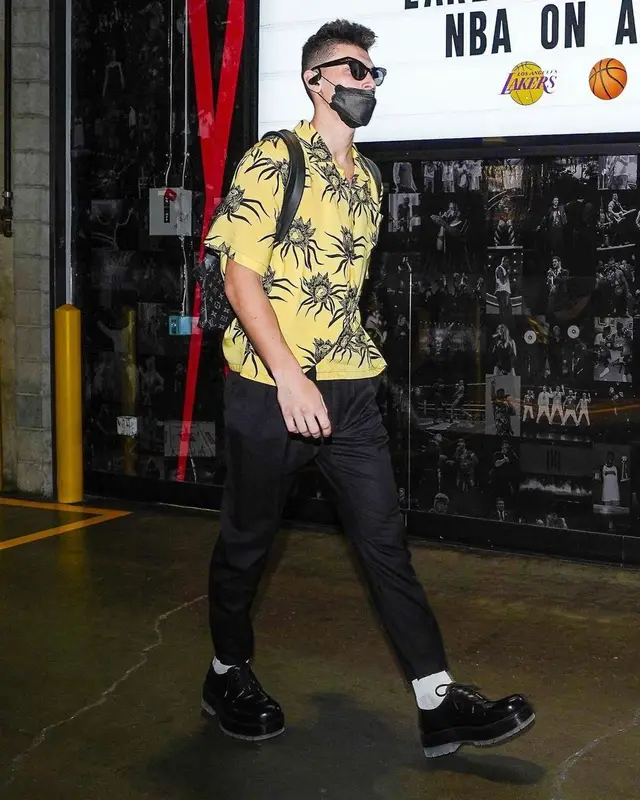 Tyler Herro outfit in Celine, Bottega Veneta, and Louis Vuitton, 2021