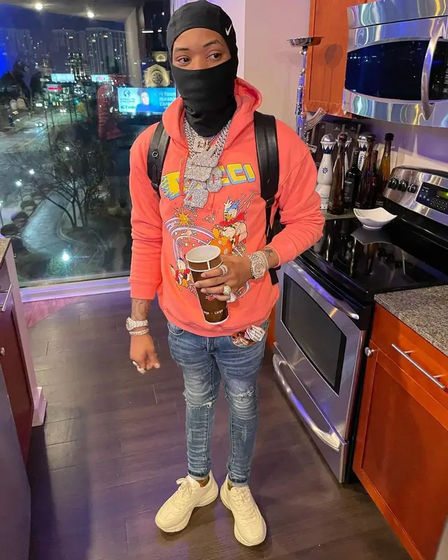 Lil Migo outfit in Gucci and Nike, 2021