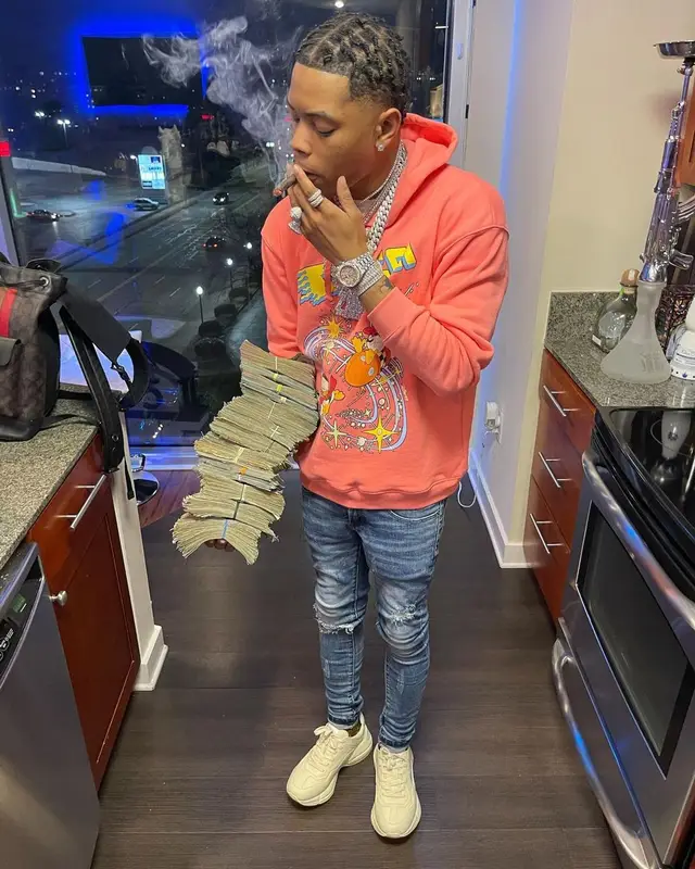 Lil Migo outfit in Gucci and Nike, 2021