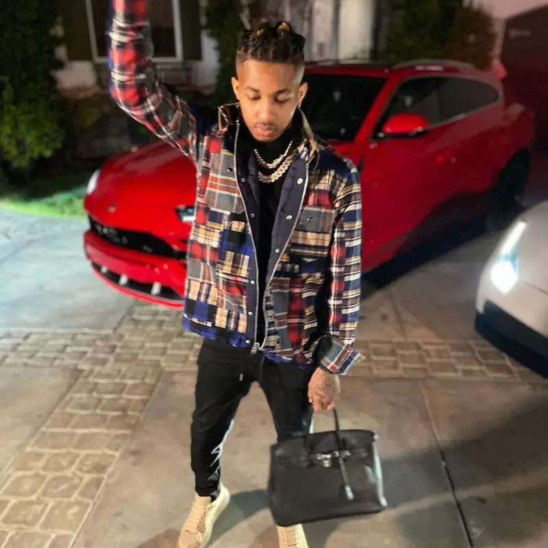 DDG outfit in Sacai, Valentino, and Hermes, 2021