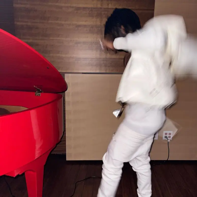 Lil Uzi Vert outfit in Moncler, True Religion, and Nike, 2021