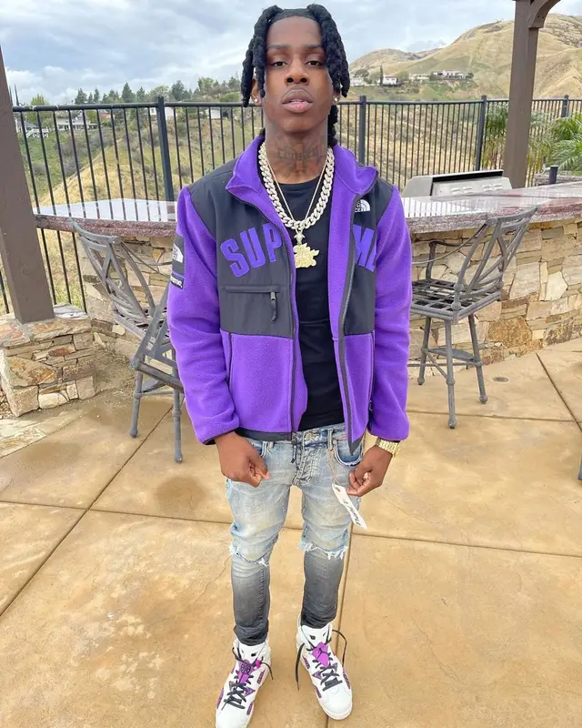 Polo G outfit in Supreme, Purple Brand, and The North Face, 2021