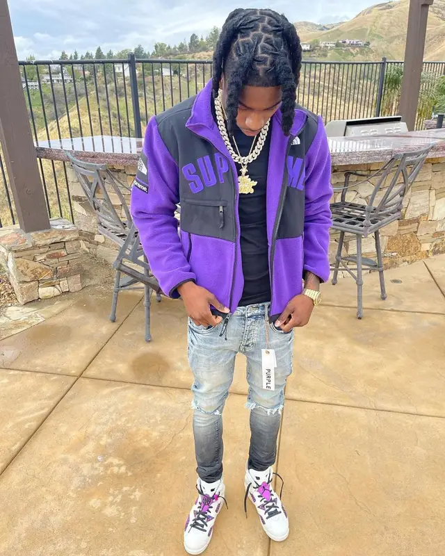 Polo G outfit in Supreme, Purple Brand, and The North Face, 2021