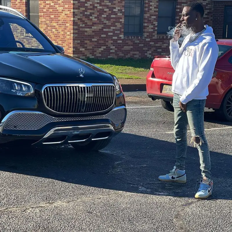 Young Dolph outfit in Dior, Amiri, and Nike, 2021