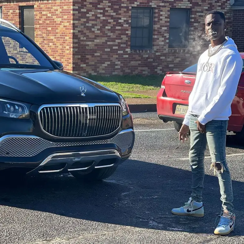 Young Dolph outfit in Dior, Amiri, and Nike, 2021