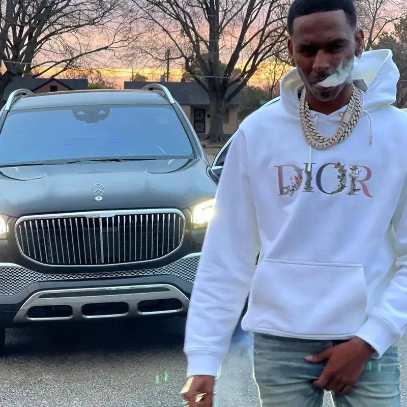 Young Dolph outfit in Dior, Amiri, and Nike, 2021