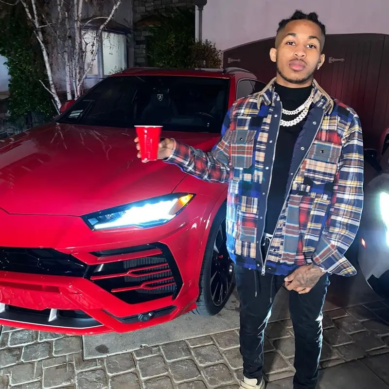 DDG outfit in Sacai, Valentino, and Hermes, 2021