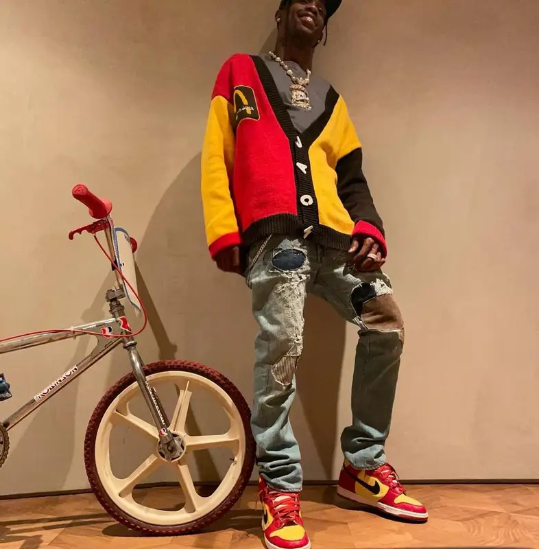 Travis Scott outfit in Travis Scott Merch, Cactus Plant Flea Market, and McDonald's Merch, 2021