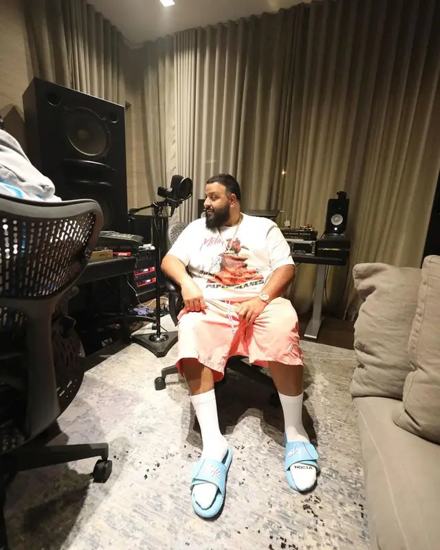 DJ Khaled outfit in AC Milan, Paper Planes, and Nike, 2021