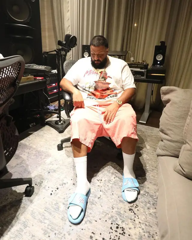 DJ Khaled outfit in AC Milan, Paper Planes, and Nike, 2021