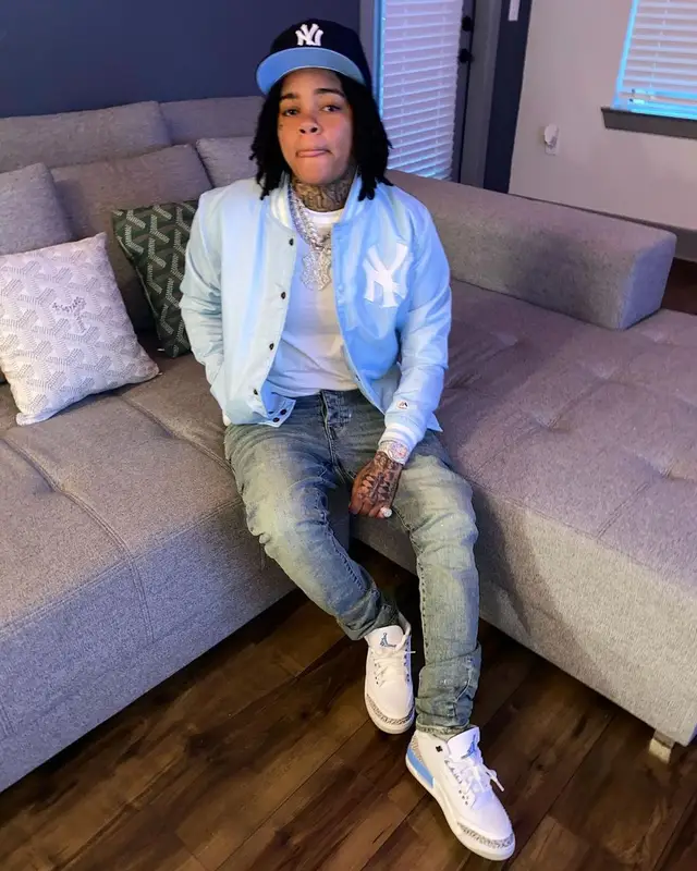 Young M.A outfit in Vintage, Purple Brand, and New Era, 2021