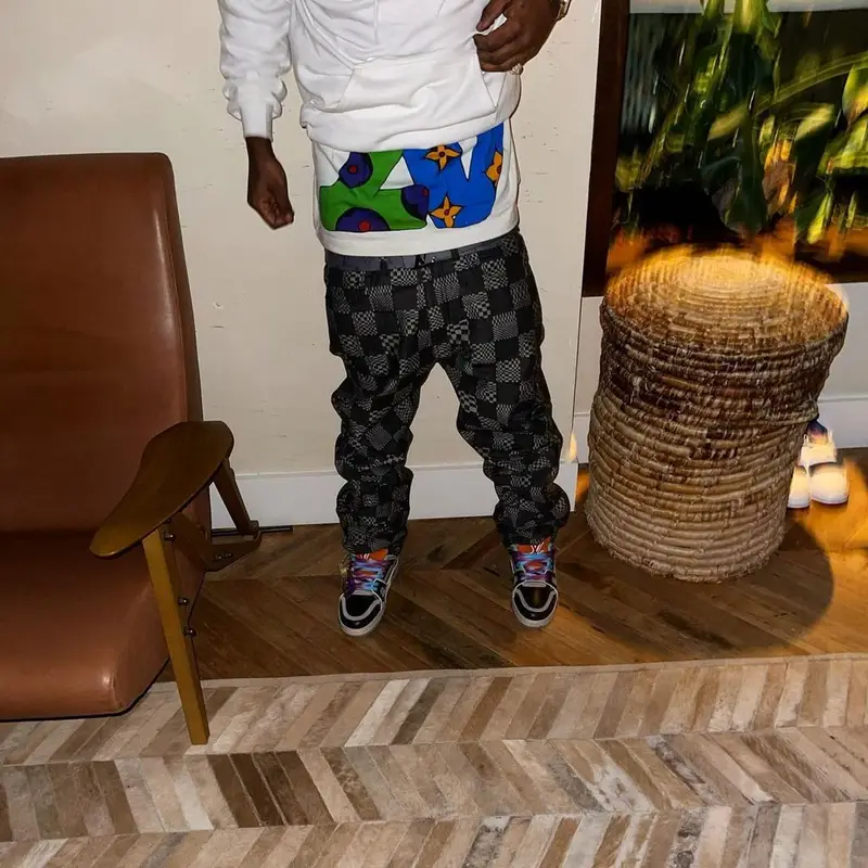 Lil Uzi Vert outfit in Human Made, Louis Vuitton, and Goyard, 2021