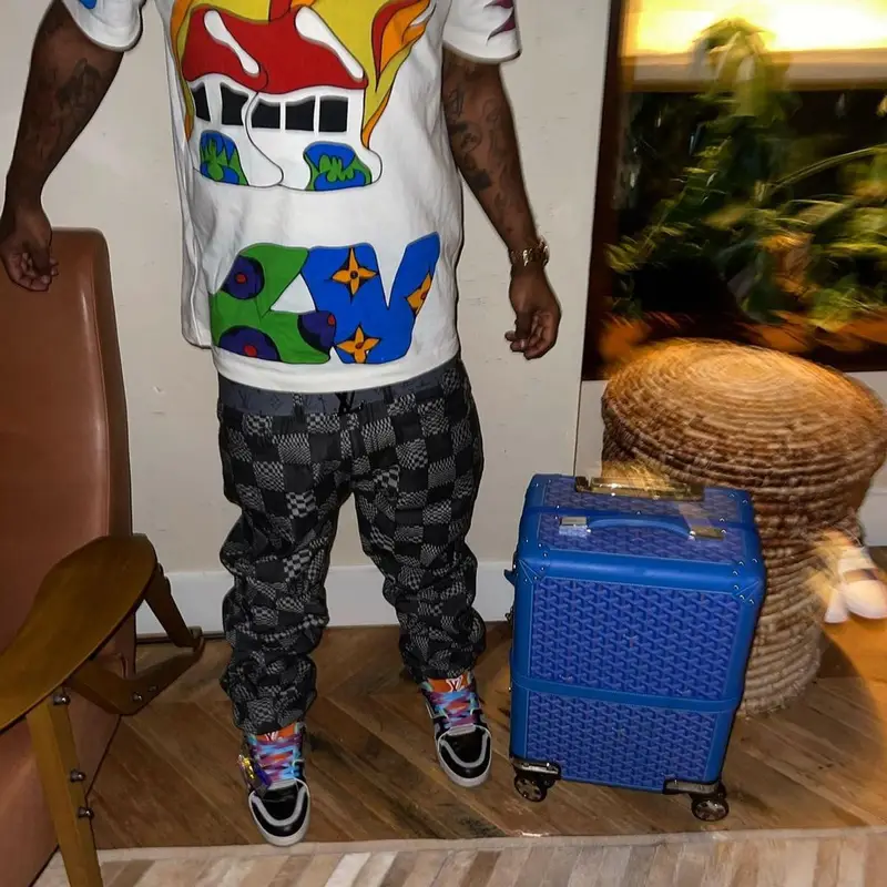 Lil Uzi Vert outfit in Human Made, Louis Vuitton, and Goyard, 2021