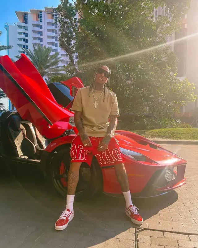 Tyga outfit in Rhude, Vans, and Louis Vuitton, 2021