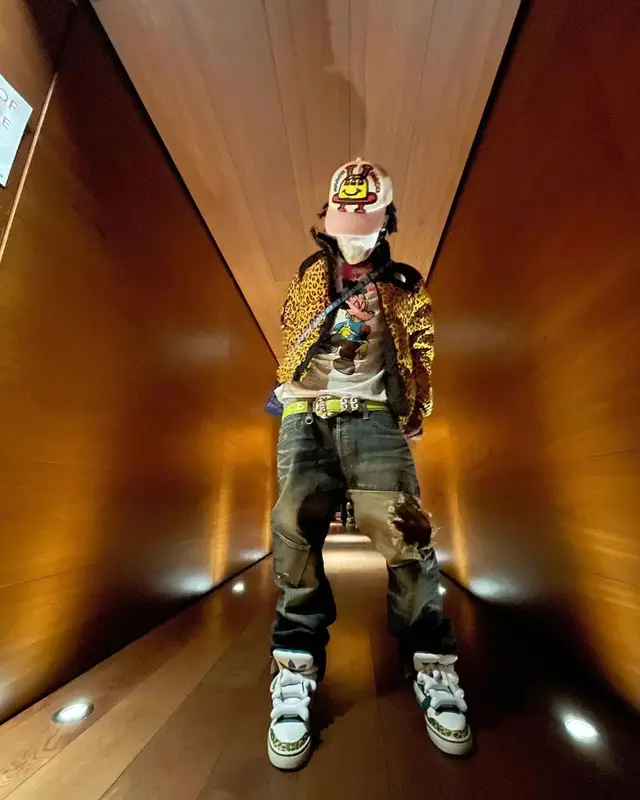 Lil Uzi Vert outfit in Supreme, Hysteric Glamour, and Human Made, 2021