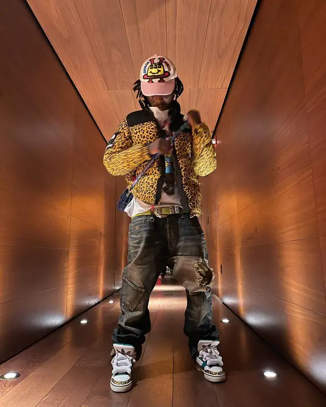 Lil Uzi Vert outfit in Supreme, Hysteric Glamour, and Human Made, 2021