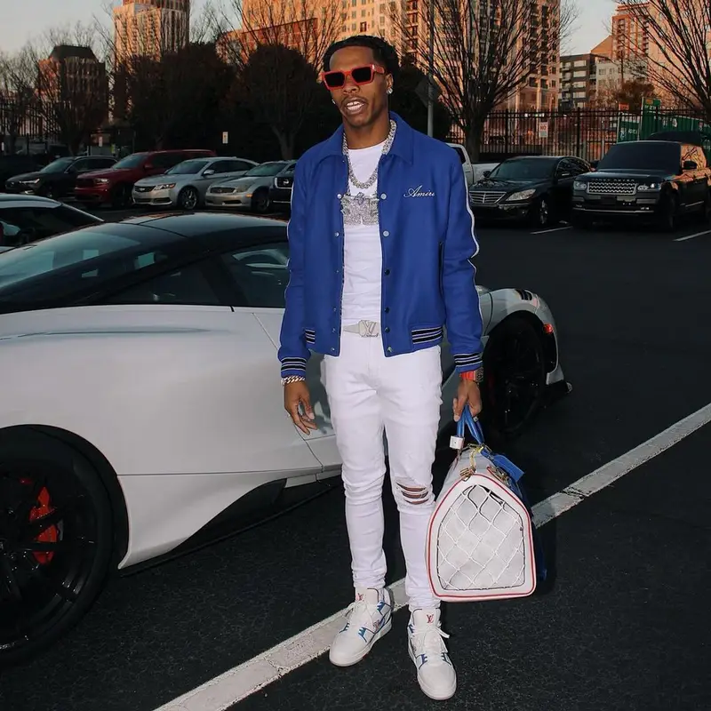 Lil Baby outfit in Amiri, NBA, and Louis Vuitton, 2021