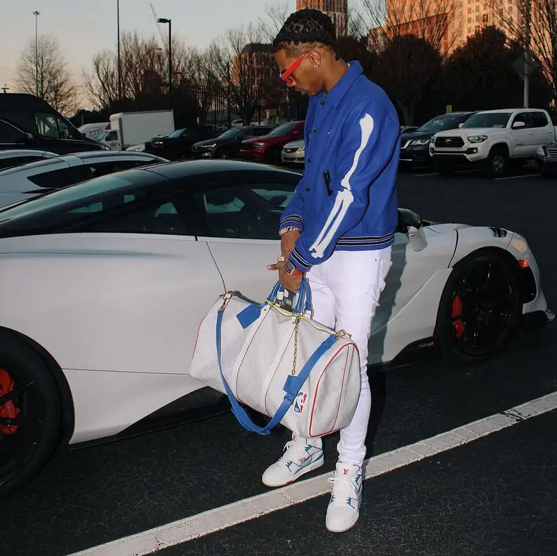 Lil Baby outfit in Amiri, NBA, and Louis Vuitton, 2021