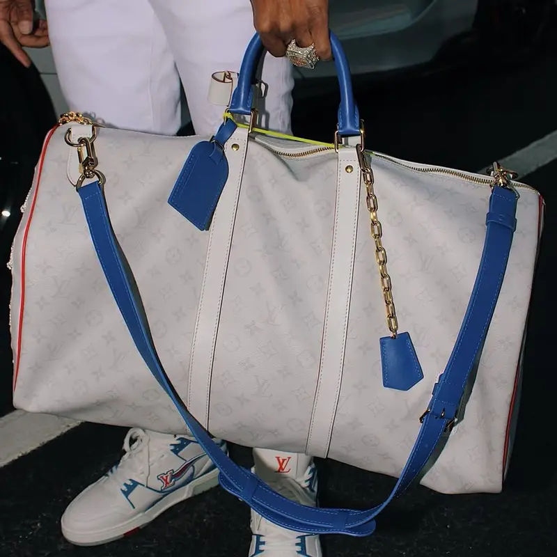 Lil Baby outfit in Amiri, NBA, and Louis Vuitton, 2021