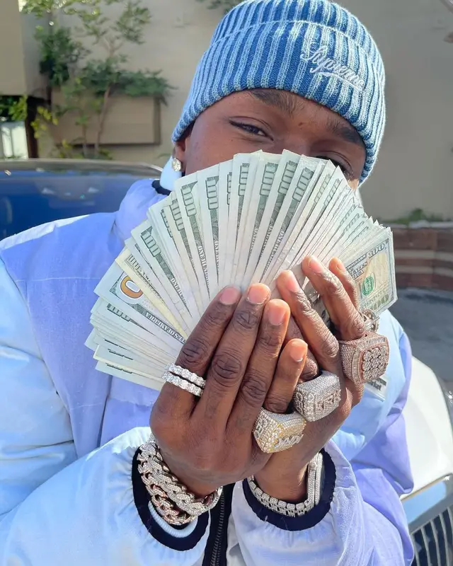 DaBaby outfit in Market, Burberry, and Supreme, 2021