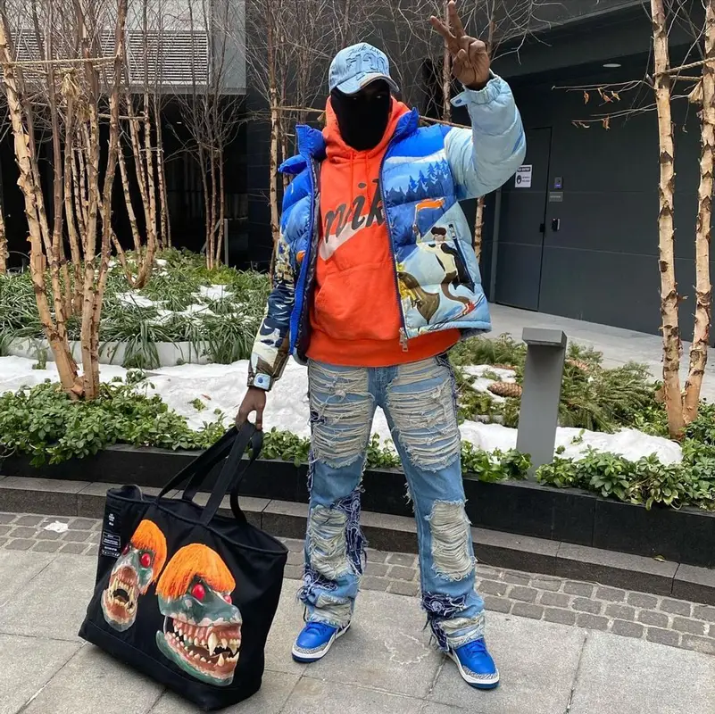Sheck Wes outfit in Moncler, Nike, and Cactus Plant Flea Market, 2021