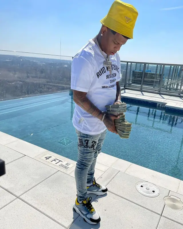 Rylo Rodriguez outfit in Dior, Amiri, and Prada, 2021