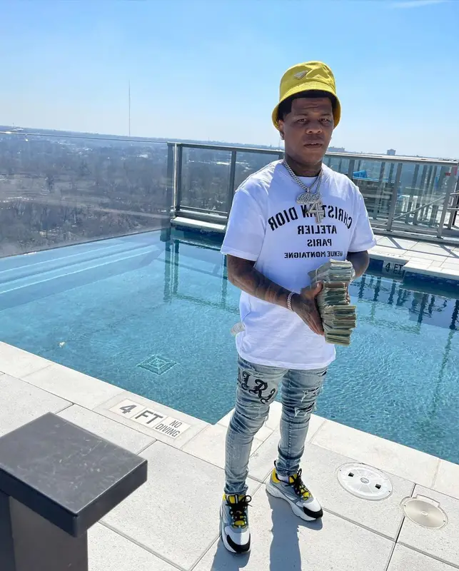 Rylo Rodriguez outfit in Dior, Amiri, and Prada, 2021