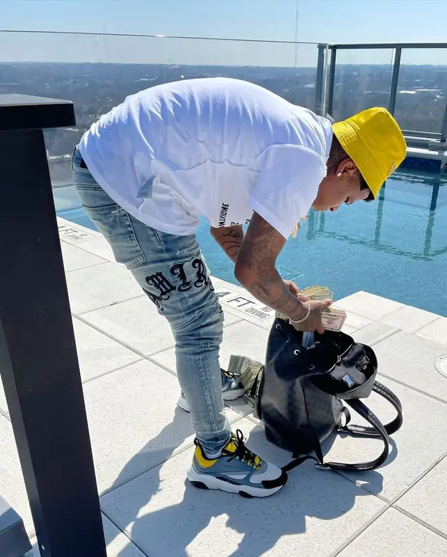 Rylo Rodriguez outfit in Dior, Amiri, and Prada, 2021