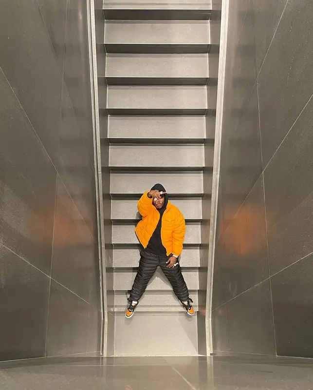 DaBaby outfit in Supreme, Nike, and Amiri, 2021