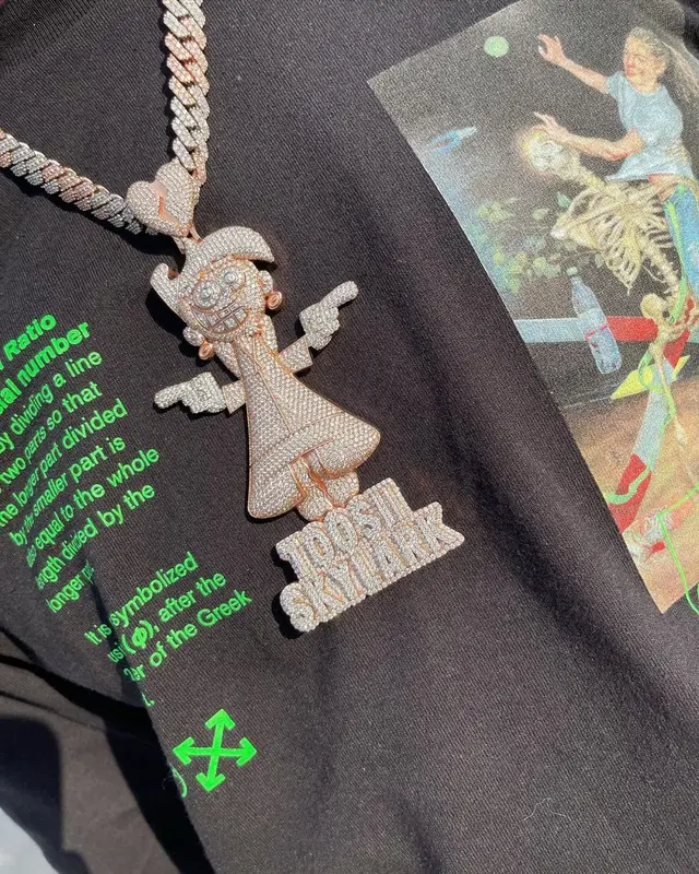 Toosii outfit in Off-White, Amiri, and New Era, 2021