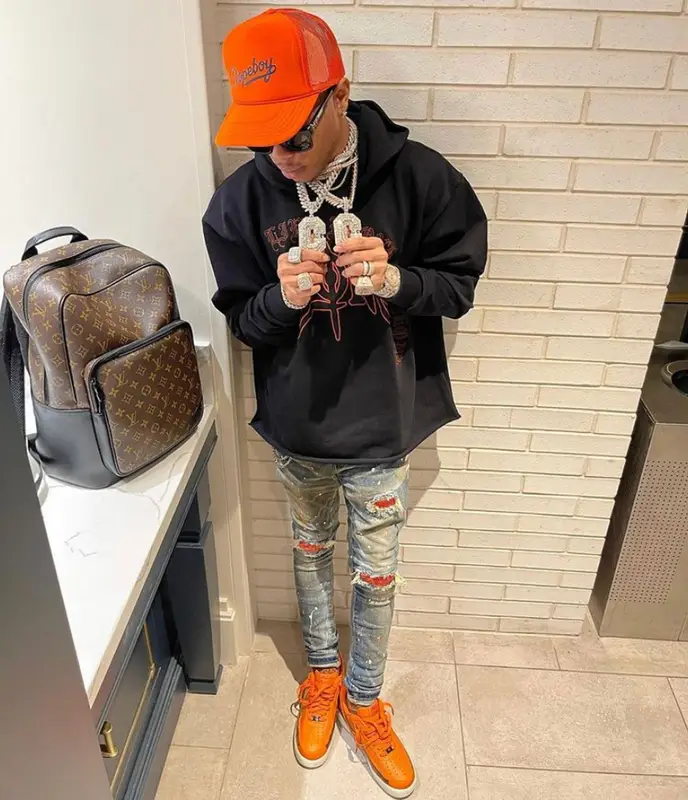 Lil Migo outfit in Tulones, Louis Vuitton, and Gucci, 2021
