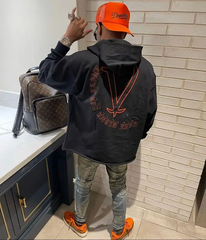 Lil Migo outfit in Tulones, Louis Vuitton, and Gucci, 2021