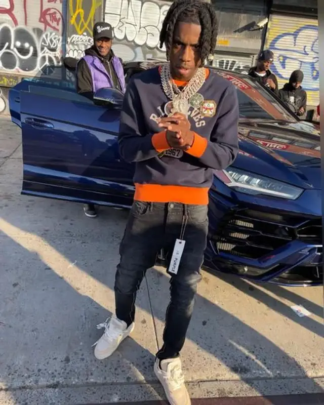 Polo G outfit in Ralph Lauren, Purple Brand, and Off-White, 2021