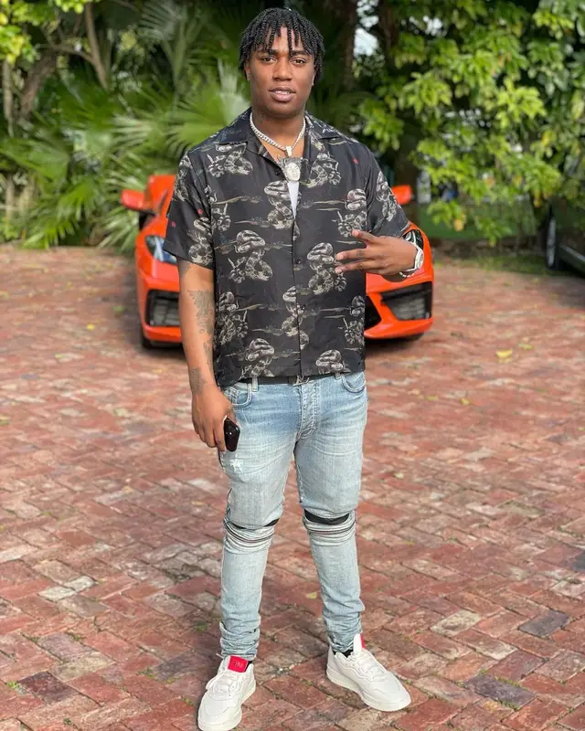 Fredo Bang outfit in Amiri, Adidas, and Louis Vuitton, 2021