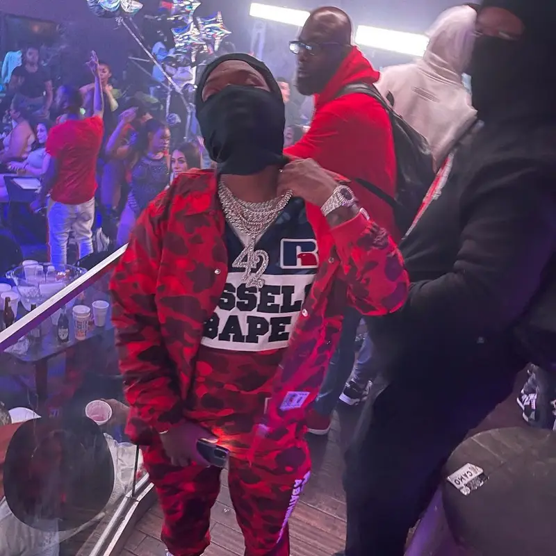 42 Dugg outfit in Bape, Russell Athletic, and Travis Scott Merch, 2021
