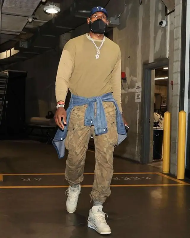 LeBron James outfit in Kanye West Merch, Jordan, and Henry Mask, 2021