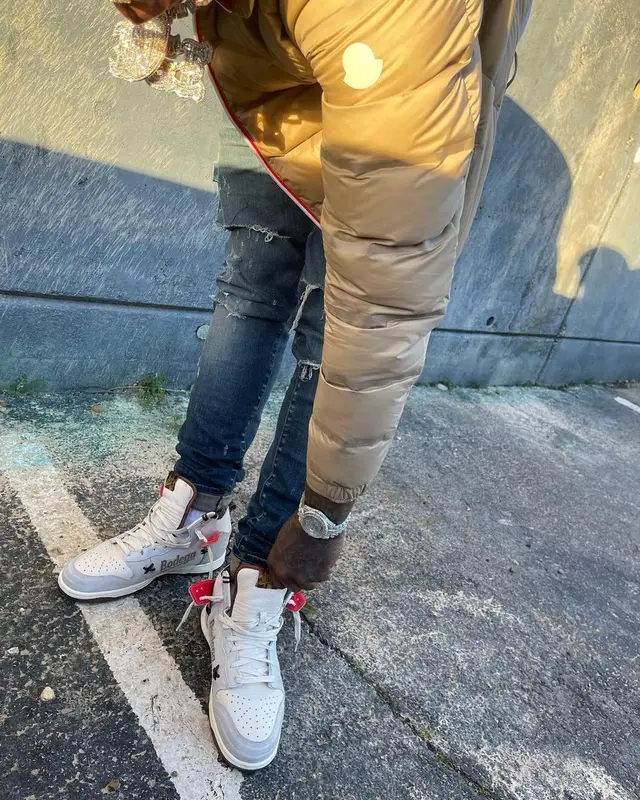 Moneybagg Yo outfit in Moncler, Cartier, and Louis Vuitton, 2021